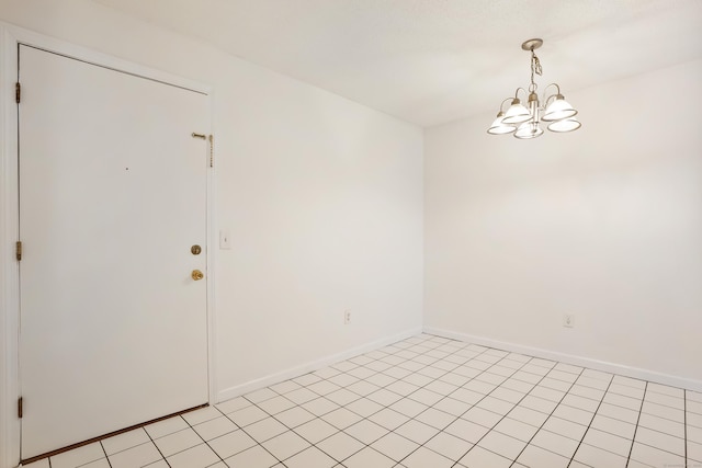34A Padanaram Ave Unit 120, Danbury, CT 06811 - empty room featuring a chandelier and baseboards
