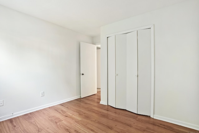 34A Padanaram Ave Unit 120, Danbury, CT 06811 - unfurnished bedroom with wood finished floors and a closet