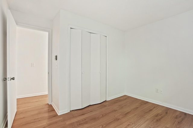34A Padanaram Ave Unit 120, Danbury, CT 06811 - unfurnished bedroom featuring light wood finished floors and a closet