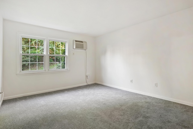 34A Padanaram Ave Unit 120, Danbury, CT 06811 - carpeted empty room featuring a wall mounted air conditioner and baseboards