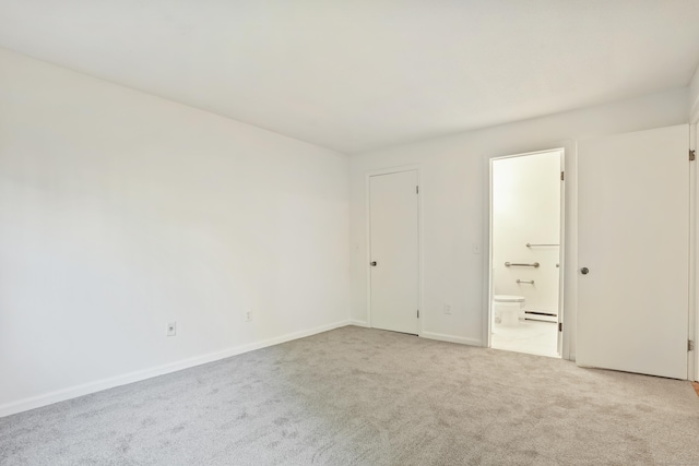 34A Padanaram Ave Unit 120, Danbury, CT 06811 - unfurnished room featuring light colored carpet and a baseboard heating unit