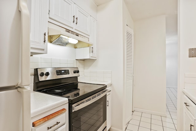 34A Padanaram Ave Unit 120, Danbury, CT 06811 - kitchen featuring stainless steel electric stove, freestanding refrigerator, under cabinet range hood, and light countertops