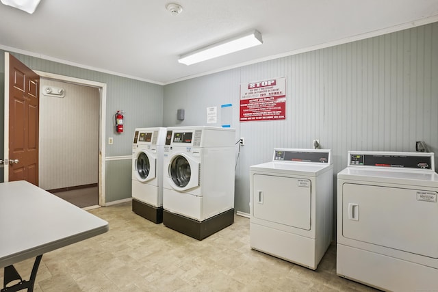 34A Padanaram Ave Unit 120, Danbury, CT 06811 - communal laundry room featuring separate washer and dryer and ornamental molding