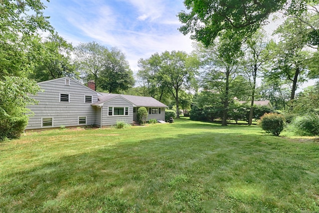 355 Surrey Ln, Fairfield, CT 06824 - view of grassy yard with view of scattered trees