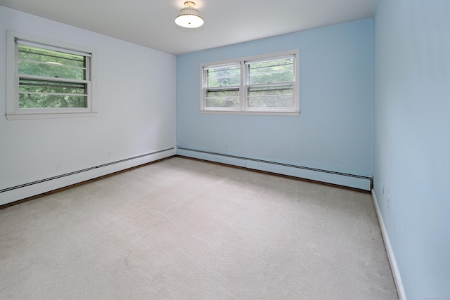 355 Surrey Ln, Fairfield, CT 06824 - unfurnished room featuring baseboard heating and carpet