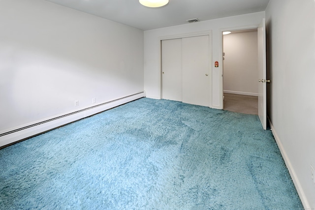 355 Surrey Ln, Fairfield, CT 06824 - unfurnished bedroom with a baseboard radiator, carpet, and a closet