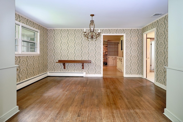 355 Surrey Ln, Fairfield, CT 06824 - unfurnished dining area with wallpapered walls, a chandelier, hardwood / wood-style floors, baseboard heating, and crown molding