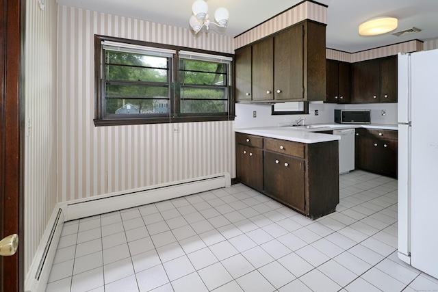 355 Surrey Ln, Fairfield, CT 06824 - kitchen with white appliances, wallpapered walls, dark brown cabinetry, light countertops, and a chandelier