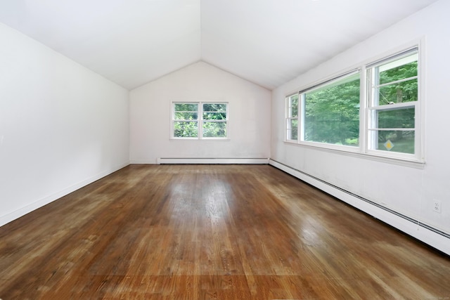 355 Surrey Ln, Fairfield, CT 06824 - spare room with a baseboard radiator, hardwood / wood-style flooring, vaulted ceiling, and a baseboard heating unit