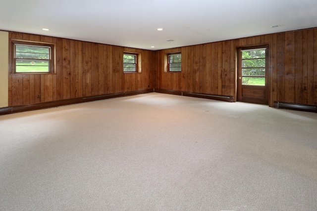 355 Surrey Ln, Fairfield, CT 06824 - unfurnished room featuring plenty of natural light, wood walls, baseboard heating, and recessed lighting