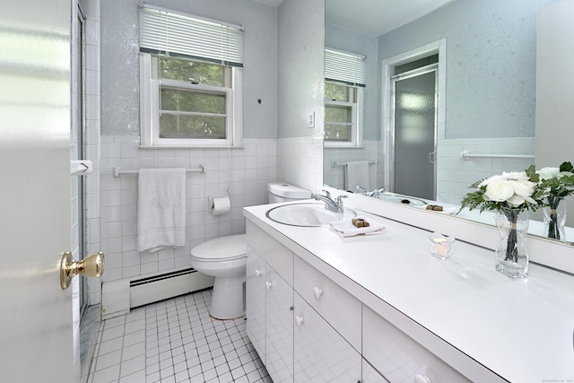 355 Surrey Ln, Fairfield, CT 06824 - bathroom with a baseboard radiator, vanity, tile walls, tile patterned flooring, and a stall shower