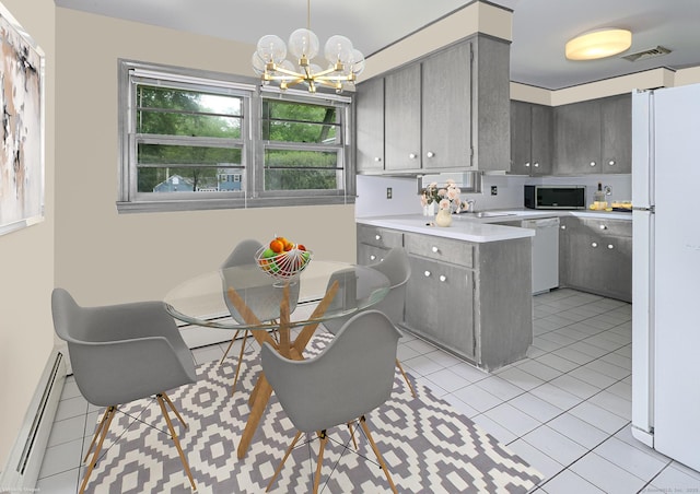 355 Surrey Ln, Fairfield, CT 06824 - kitchen featuring white appliances, gray cabinetry, a chandelier, a peninsula, and light tile patterned flooring