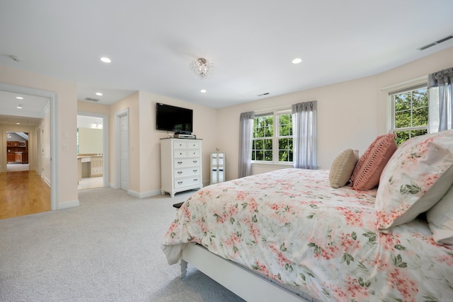 28 Sunnyview Dr, Redding, CT 06896 - bedroom featuring light colored carpet, multiple windows, and recessed lighting
