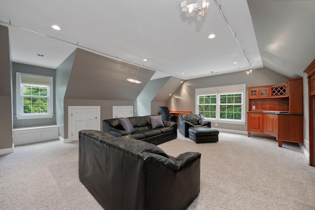 28 Sunnyview Dr, Redding, CT 06896 - living room with light colored carpet, vaulted ceiling, plenty of natural light, and recessed lighting