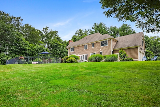 28 Sunnyview Dr, Redding, CT 06896 - rear view of house featuring a chimney