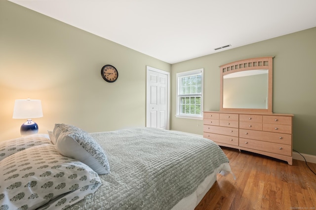 70 Shane Dr, Southbury, CT 06488 - bedroom featuring wood finished floors and a closet