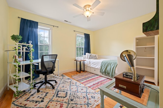 70 Shane Dr, Southbury, CT 06488 - bedroom with wood finished floors, a desk, and ceiling fan