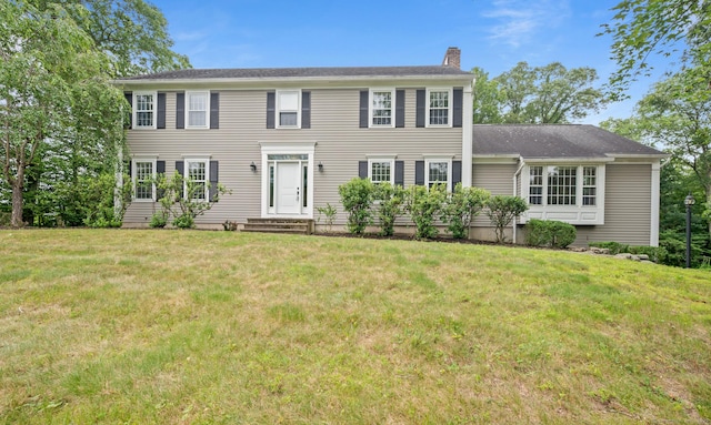 70 Shane Dr, Southbury, CT 06488 - colonial-style house with a chimney and a front lawn