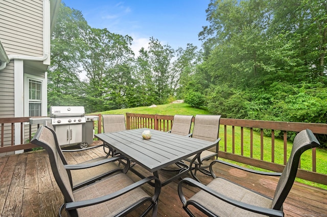 70 Shane Dr, Southbury, CT 06488 - wooden deck featuring outdoor dining area, a yard, and view of wooded area