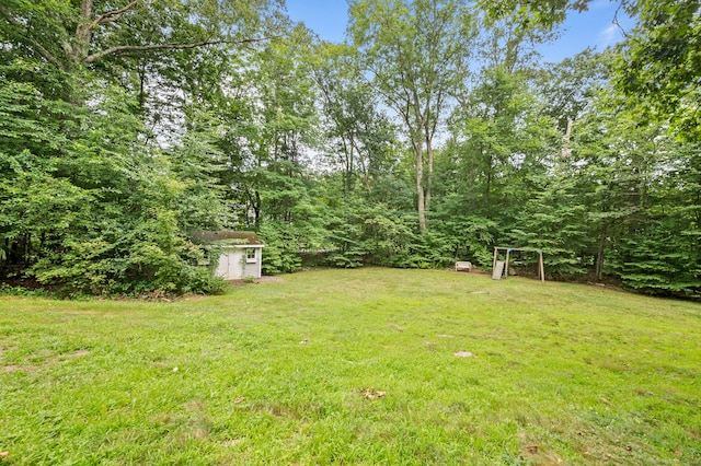 70 Shane Dr, Southbury, CT 06488 - view of green lawn featuring a shed