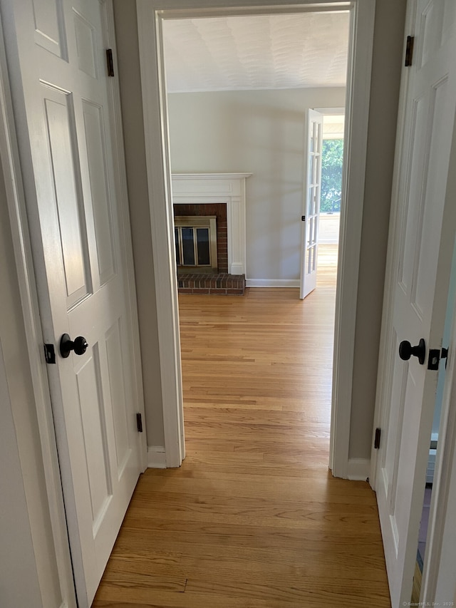 18 Depietro Dr, East Hartford, CT 06118 - corridor featuring baseboards and light wood finished floors