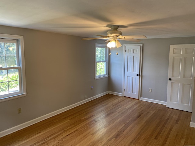18 Depietro Dr, East Hartford, CT 06118 - unfurnished bedroom with wood finished floors, a ceiling fan, and a closet