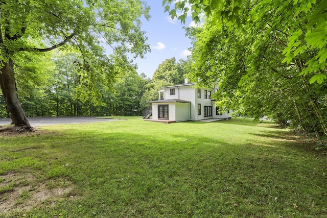 286 Marlborough St, Portland, CT 06480 - view of green lawn with french doors