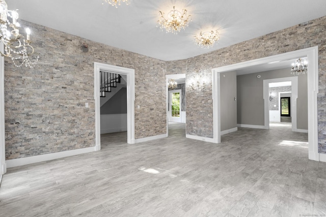 286 Marlborough St, Portland, CT 06480 - unfurnished dining area with a chandelier and wood finished floors