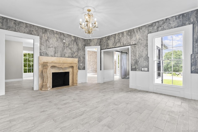 286 Marlborough St, Portland, CT 06480 - unfurnished living room featuring a chandelier, a premium fireplace, a wainscoted wall, and crown molding