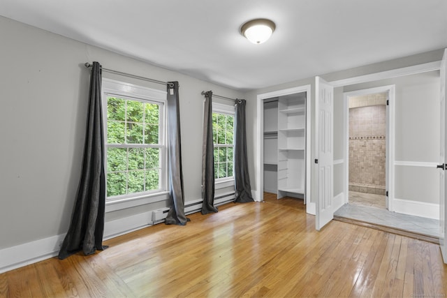 286 Marlborough St, Portland, CT 06480 - unfurnished bedroom with light wood-style flooring, a closet, and ensuite bathroom