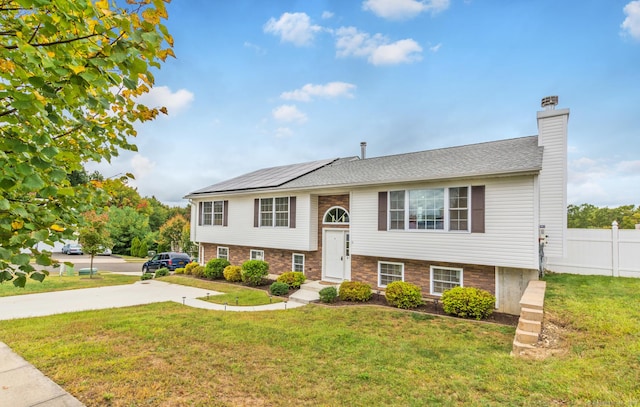 4 Wintergreen Ln, Naugatuck, CT 06770 - bi-level home featuring a chimney and concrete driveway