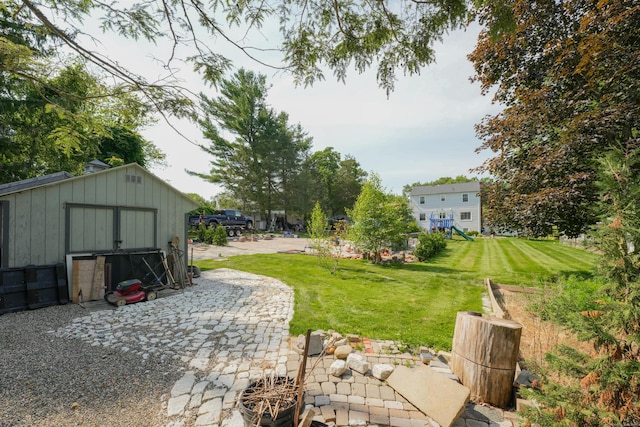 22 Standish Rd, New Milford, CT 06776 - view of grassy yard with a playground and a shed