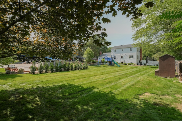 22 Standish Rd, New Milford, CT 06776 - view of yard featuring a playground and a shed
