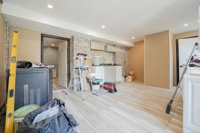 22 Standish Rd, New Milford, CT 06776 - below grade area featuring a sink and recessed lighting
