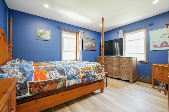 22 Standish Rd, New Milford, CT 06776 - bedroom featuring multiple windows, baseboard heating, recessed lighting, and light wood-style floors