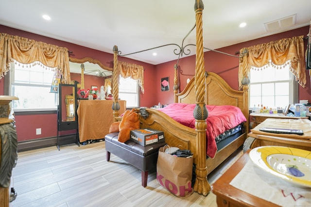22 Standish Rd, New Milford, CT 06776 - bedroom featuring multiple windows, wood finished floors, a baseboard heating unit, and recessed lighting