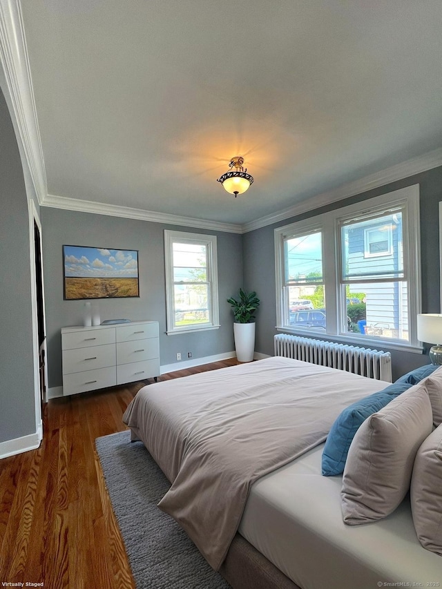 50 Norman St, Waterbury, CT 06708 - bedroom with radiator, crown molding, and wood finished floors