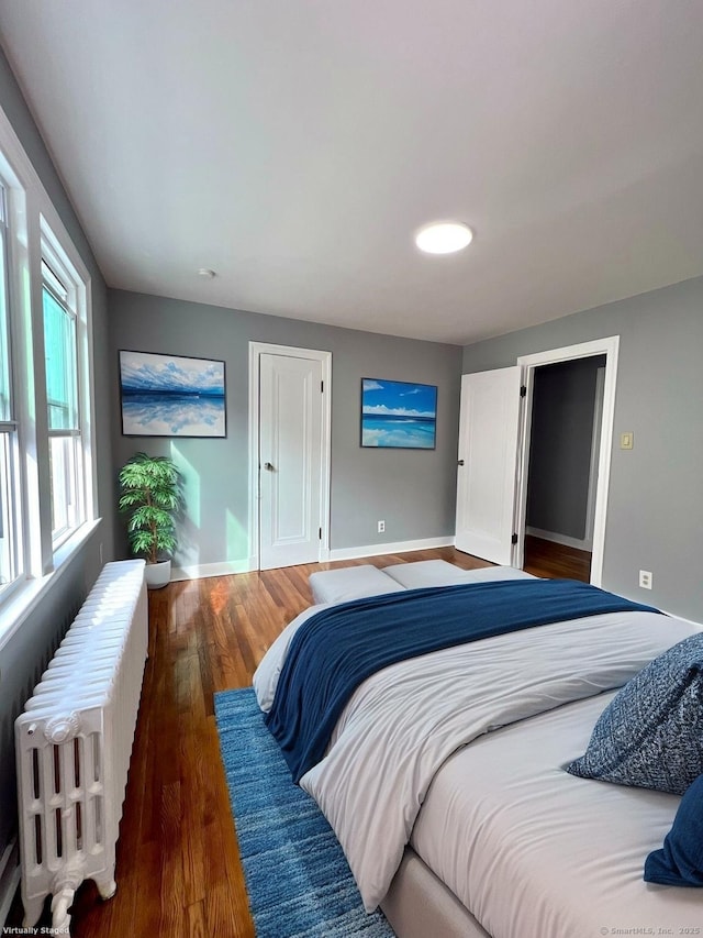 50 Norman St, Waterbury, CT 06708 - bedroom with radiator and wood finished floors