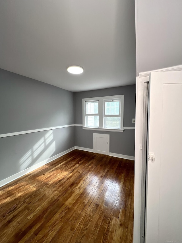 50 Norman St, Waterbury, CT 06708 - unfurnished room featuring dark wood-style floors and baseboards