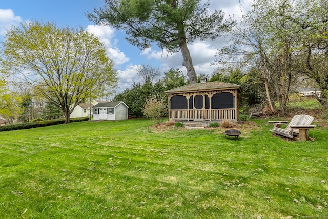 52 Lincoln St, Cromwell, CT 06416 - view of green lawn featuring a gazebo and an outdoor fire pit