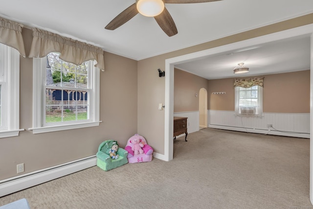 52 Lincoln St, Cromwell, CT 06416 - recreation room with a baseboard radiator, carpet floors, wainscoting, a ceiling fan, and cooling unit
