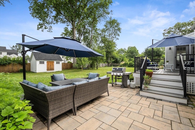 10 Craigmoor Rd, West Hartford, CT 06107 - fenced backyard featuring a patio area, outdoor lounge area, a wooden deck, a shed, and grilling area