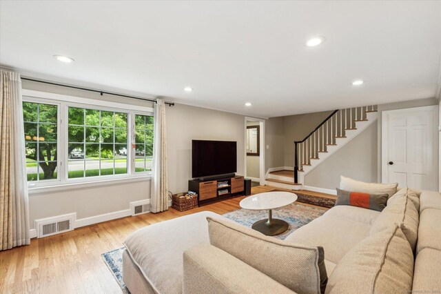 10 Craigmoor Rd, West Hartford, CT 06107 - living room with stairway, recessed lighting, and wood finished floors