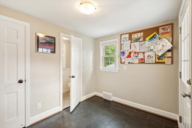10 Craigmoor Rd, West Hartford, CT 06107 - unfurnished bedroom with baseboards and ensuite bathroom