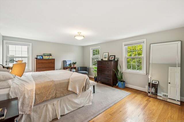 10 Craigmoor Rd, West Hartford, CT 06107 - bedroom featuring light wood-style flooring and baseboards