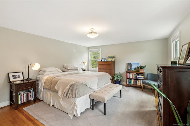 10 Craigmoor Rd, West Hartford, CT 06107 - bedroom with baseboards and wood finished floors