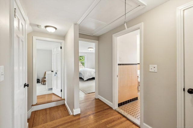 10 Craigmoor Rd, West Hartford, CT 06107 - corridor featuring attic access and light wood-type flooring