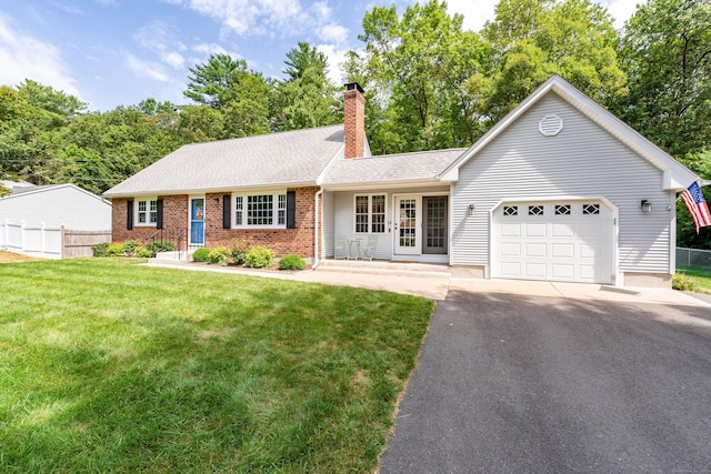 single story home featuring asphalt driveway, an attached garage, a chimney, brick siding, and a shingled roof