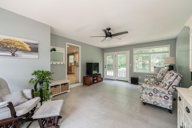 living room with a ceiling fan