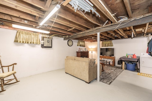 basement featuring washer / dryer and electric panel